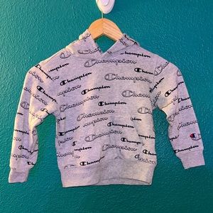Champions all over logo hoodie kid size 5